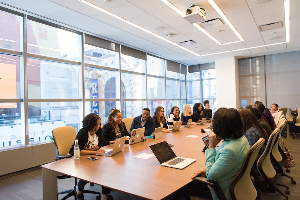 Investment team reviewing plans together at a shared table